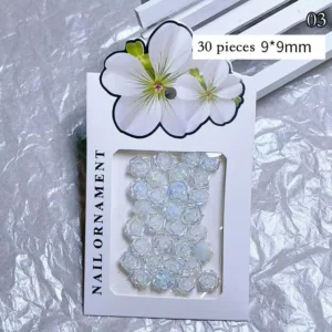 Light blue iridescent resin roses for nails in retail package