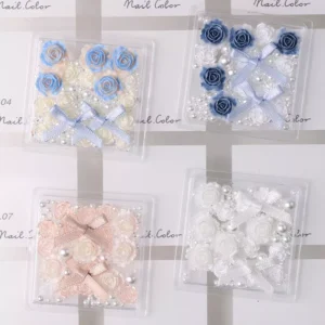 Romantic Rose Nail Art Kit with blue and ivory 3D roses, pearls, and bows – top view