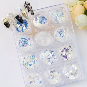 Blue nail glitter sequins set with iridescent stars, hexagons, and shimmer flakes in 12 compartments