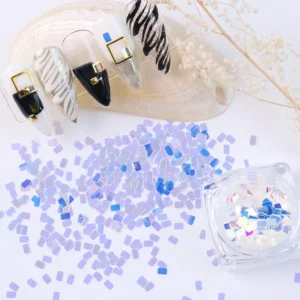 Iridescent rectangle nail glitter flakes with black and white nail samples