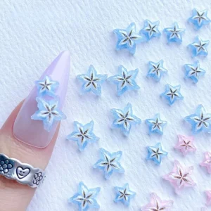 Blue 3D starfruit nail charms on lavender nail base with silver ring