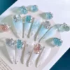 Ice crack diamond nail charms blue and pink gradient nails adorned with luxurious rhinestones