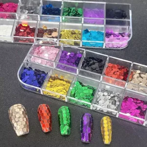 Large round holographic nail sequins applied to nail tips