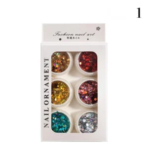 Boxed nail glitter set with red, gold, green, silver tones