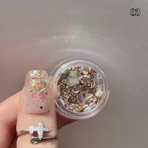 Mixed bronze foil and iridescent shell shards for nail decoration
