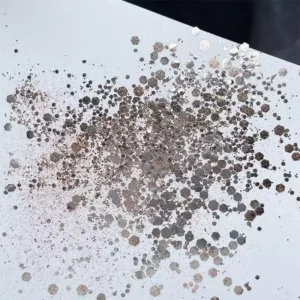 Bronze metallic glitter flakes in varied hexagon sizes for nail art