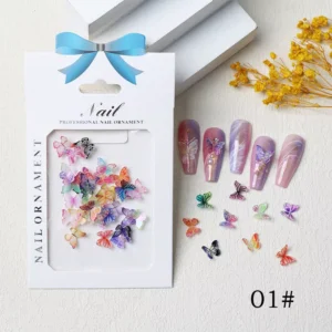 Aurora butterfly nail charms set in packaging with sample nail display – style 01