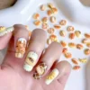 Cartoon Bread Nail Charms - Cute 3D Bakery Delights 14 Close-up of pastel manicure with Cartoon Bread Nail Charms in croissant and bun shapes