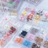 Cartoon Nail Charms - Cute 3D Animal & Anime Pieces 10 Clear box of assorted Cartoon Nail Charms with cute 3D animal and anime figures in pastel colors
