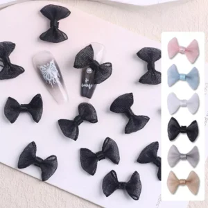 Charming mesh bow nail charms in black with nail art application