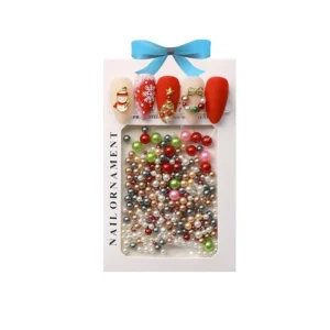 Christmas nail charm packaging with festive nail art samples