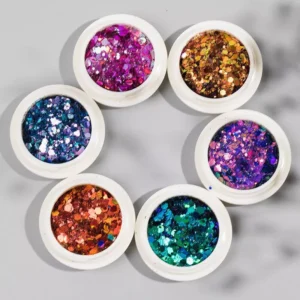 Six glitter pots arranged in a circular formation showcasing multicolor chunky nail sequins