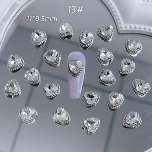 Heart-shaped transparent rhinestone nail decoration in alloy frame