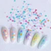 Colorful Flat Nail Sequins - Iridescent Confetti Shapes 5 Colorful Flat Nail Sequins in circular shape scattered with nail art display