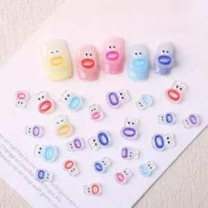 Multicolor bear-shaped 3D resin nail charms applied on pastel nails