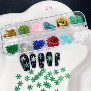 Snowflake-shaped glitter in pastel and bold shades for winter-themed nail art
