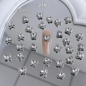 Butterfly-shaped crystal charm in silver for nail art design