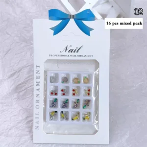 Assorted crystal fruit nail charms including cherries, bananas, grapes, and peaches