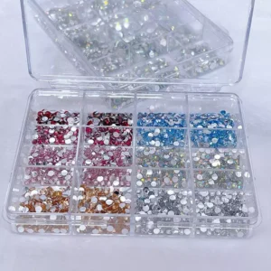 Mixed color crystal nail rhinestones in a clear 12-grid box