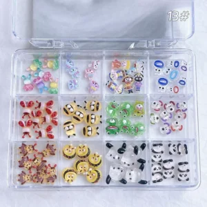 Cute Cartoon Mixed Nail Charms arranged in a grid display case with assorted colorful resin pieces