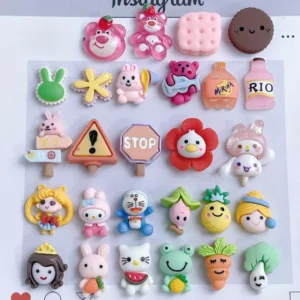 Flat layout of individual Cartoon Nail Charms featuring anime characters, animals, and cute icons