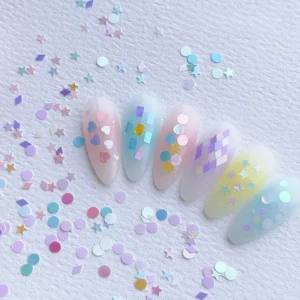 DIY Nail Sequins Kit with assorted pastel shapes on nail tips