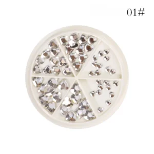 Round case of Dazzling Crystal Nail Charms in heart and diamond shapes