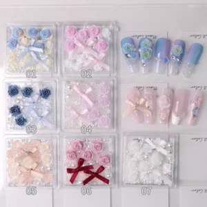 3D navy and white rose nail decorations with pearl and ribbon accents