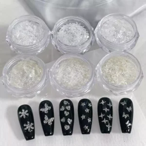Diamond nail sequins with iridescent butterfly and star shapes on black nails