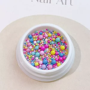 Mixed-size colorful nail beads in bright dopamine shades