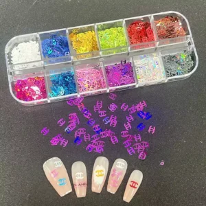 Holographic Chanel-style logo nail sequins in pink, blue, gold and more