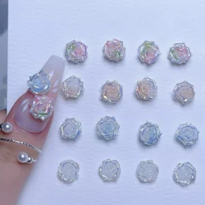 Close-up of nail with dual gradient rose charms in pink and blue