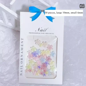 Assortment of large and small 3D pastel flower charms in box