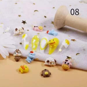 Bright yellow duck nail charms with multicolor animals on white mesh