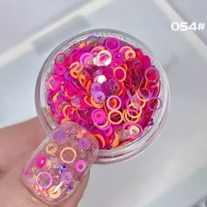 Electric pink and orange nail art glitter with translucent jelly circle sequins