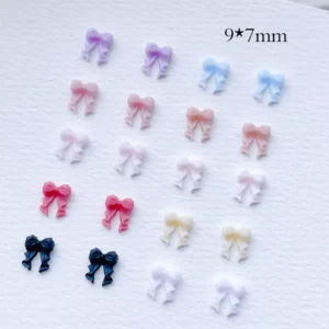 Textured 3D Ribbon Bow Nail Charms with flowing tails, 9×7mm style