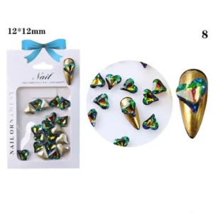 Multicolor green-shifting crystal heart on gold nail