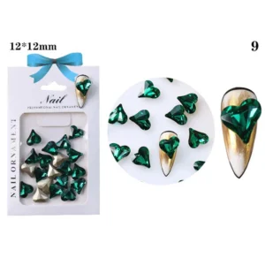 Deep emerald heart crystal on gold base
