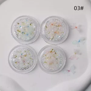 Fantasy butterfly nail art with rhinestones and sheer wings