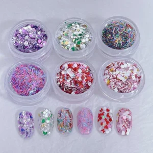 Vibrant colorful nail glitter including hearts, bars, and confetti shapes