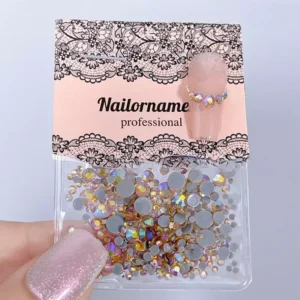 Fire opal inspired nail rhinestones with warm iridescent tones