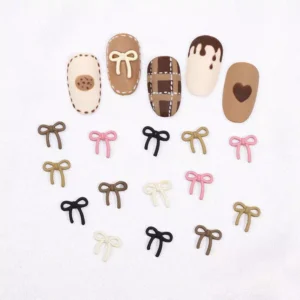 Flat mini bow nail charms for subtle nail embellishment in pastel and neutral tones