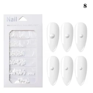 White flat pearl nail embellishments in various sizes