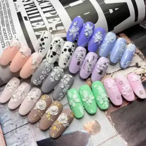 Sculpted floral nail tips made using 3D Carving Gel in various colors