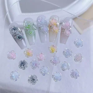 Gradient rose charms with rhinestones on clear nail tips