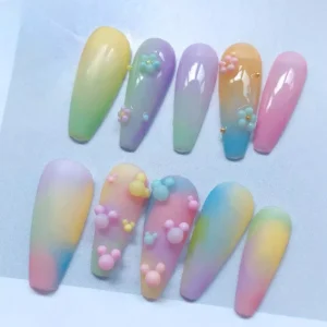 Gradient nail tips with 3D macaron bead flowers and clusters in soft pastel shades