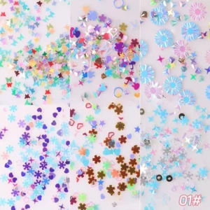 Assorted holographic flower nail glitter close-up showing shapes like butterflies and hearts