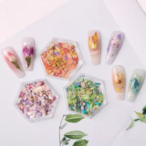 Assorted floral nail embellishments with real dried petals in various hues