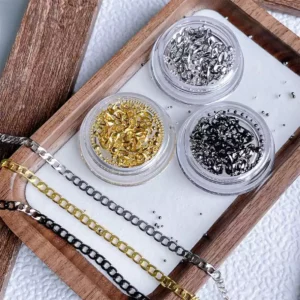 Complete 3-piece nail decor set with gold, black, and silver chain charms