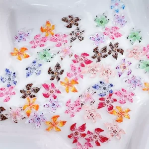 Collection of 3D resin lily flower nail stickers in full set packaging